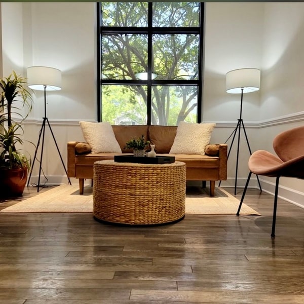 Spacious waiting room with a cozy furniture and wide window